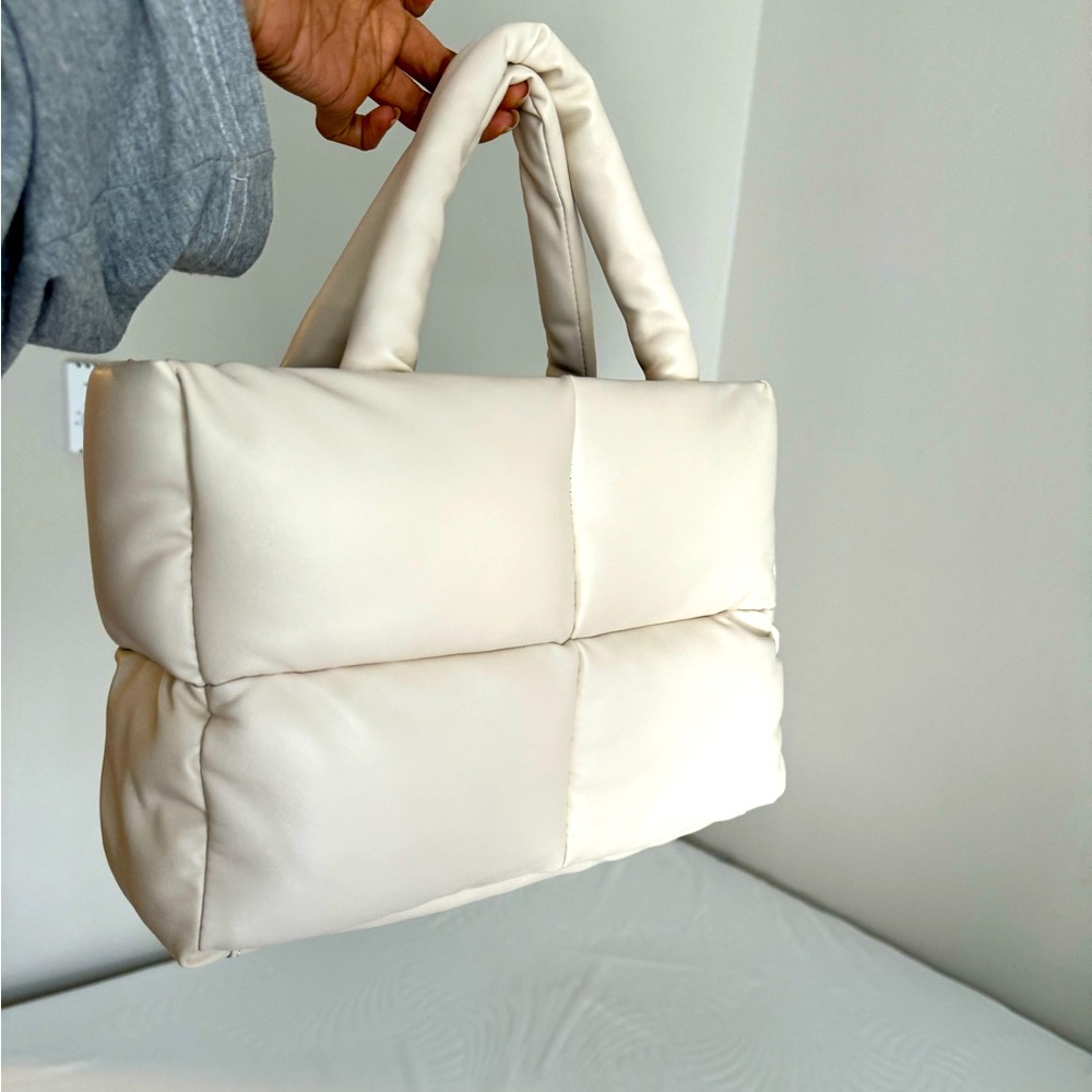 White hand bag